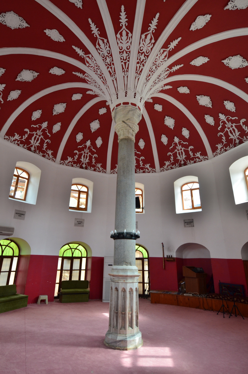 The old timber-galleried interior of the Şahkulu Sultan lodge cemevi in Istanbul