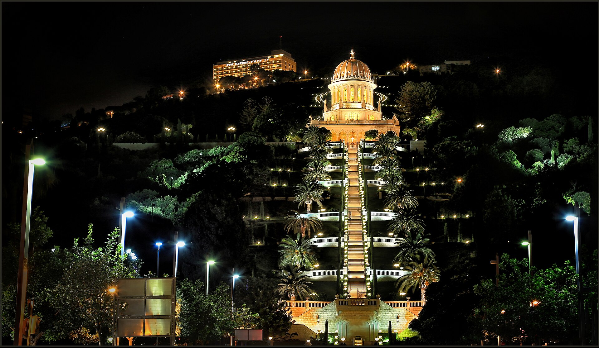 The golden-domed Shrine of the Báb amid the terraced gardens descending Mount Carmel in Haifa