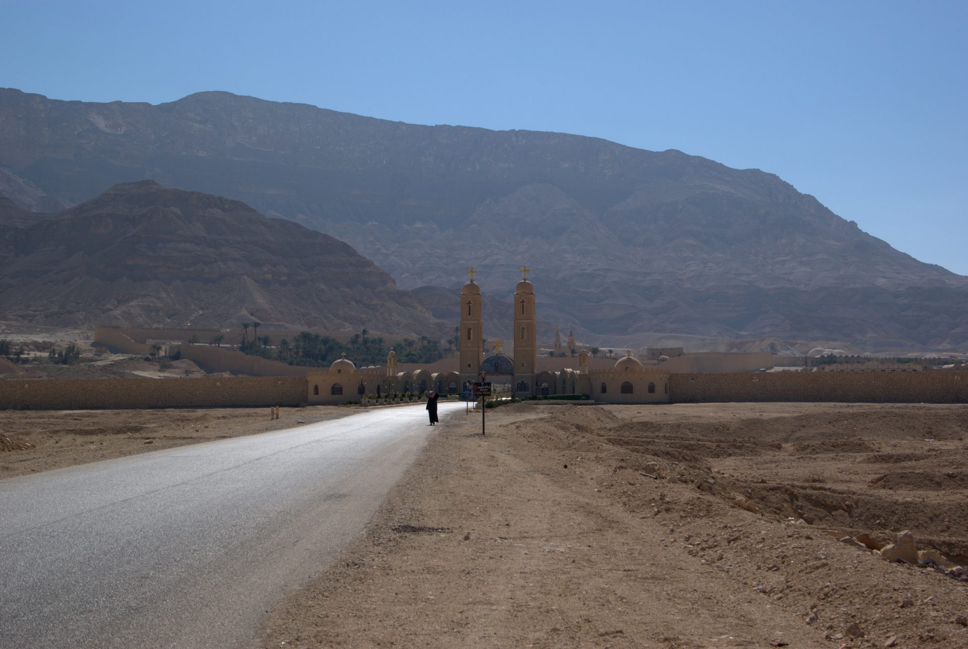 The fortified desert monastery of Saint Anthony beneath barren mountains