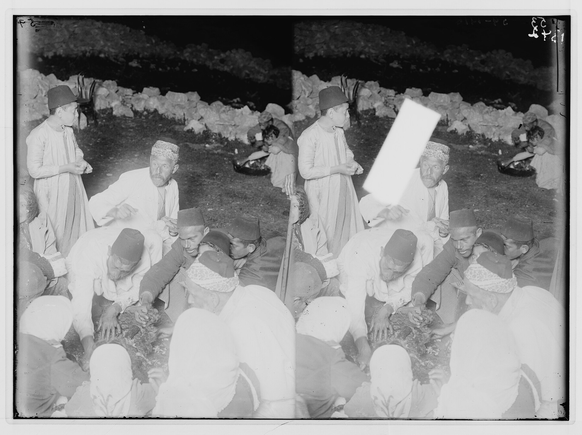 Samaritan families eating the Passover sacrifice on Mount Gerizim, photographed circa 1900