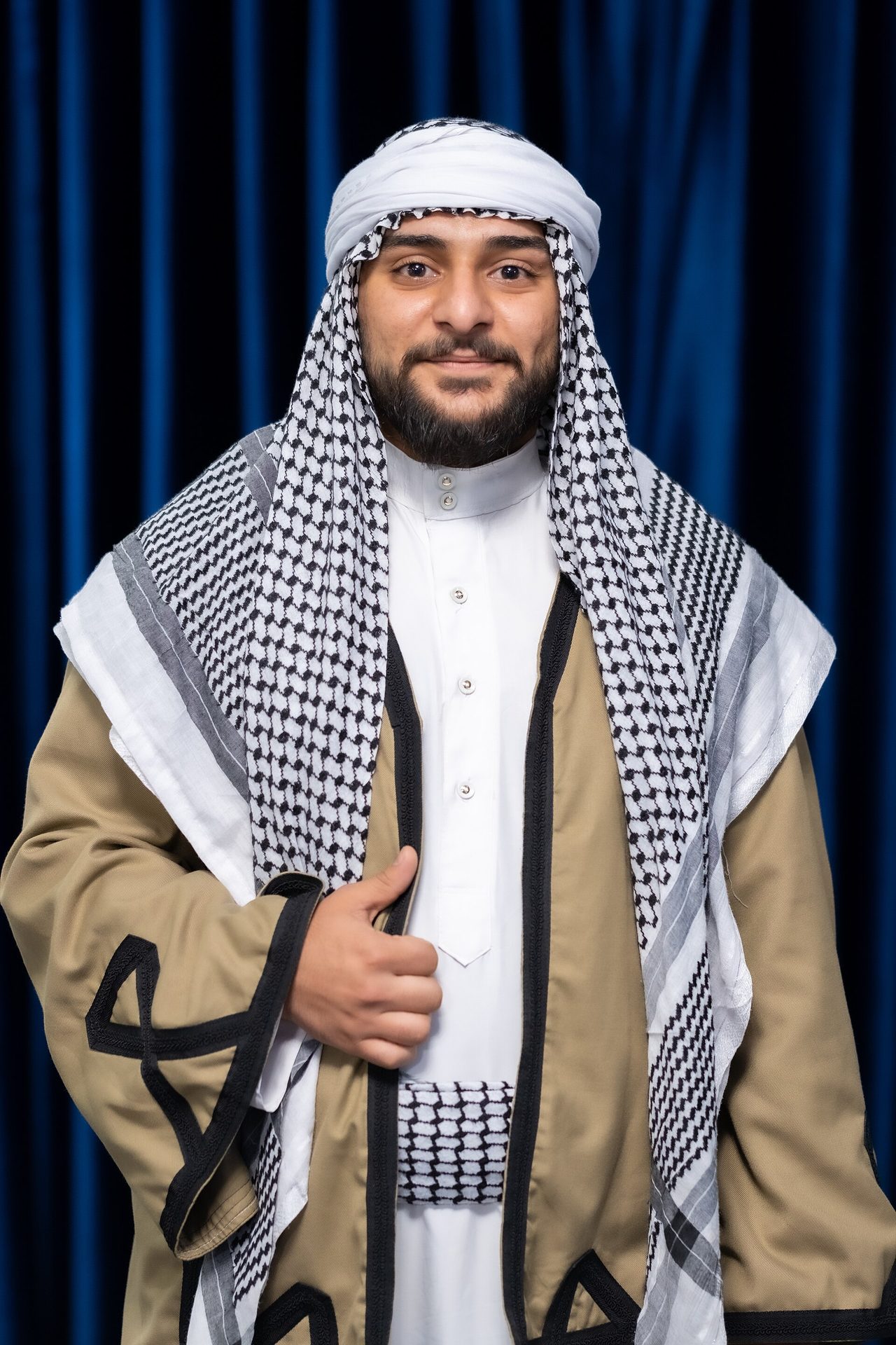 A young Shabak man in embroidered folkloric dress