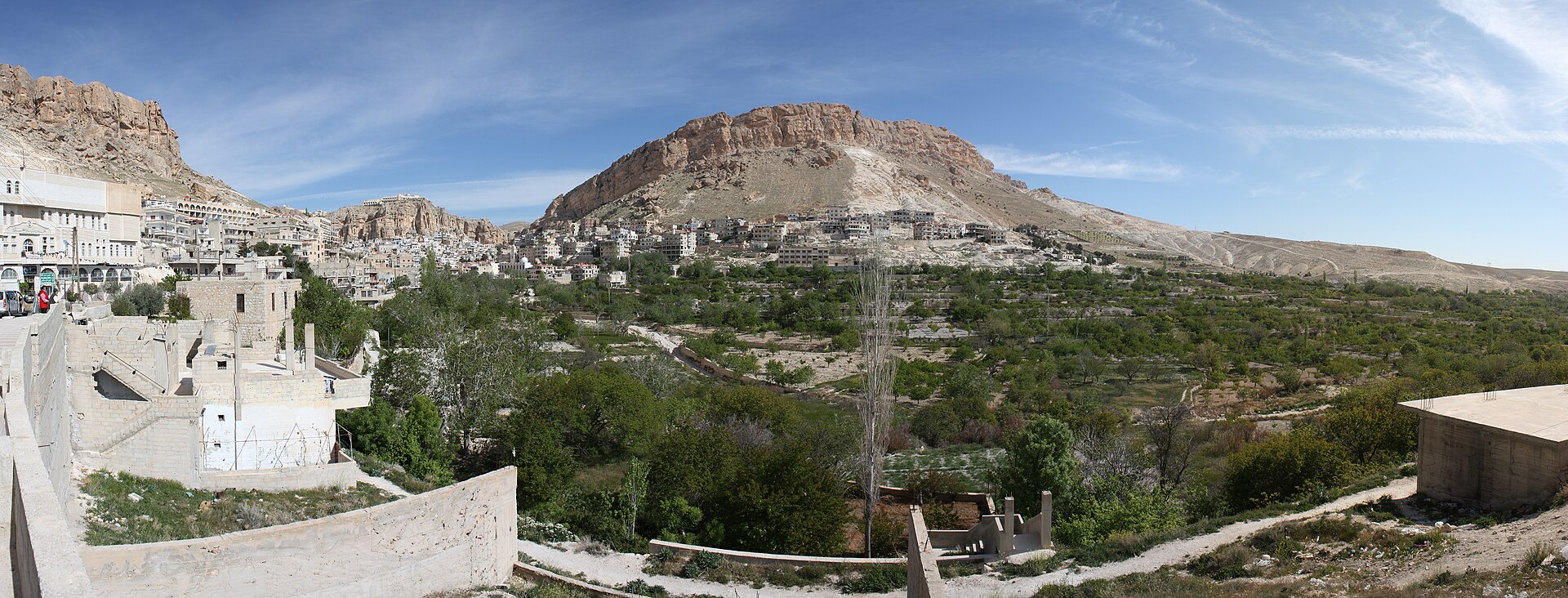 Panorama of Maaloula, its houses stacked against the cliffs of the Qalamun mountains, Syria